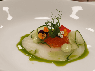 Halibut, dill oil, trout roe, pickled cucumber, herb emulsion, cream