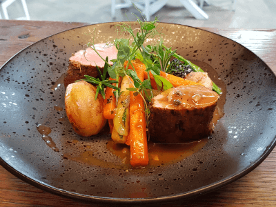 Slow cooked pork, turn potatoes, roasted veggies, black pepper sauce